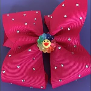 Rainbow flower smiley face bow